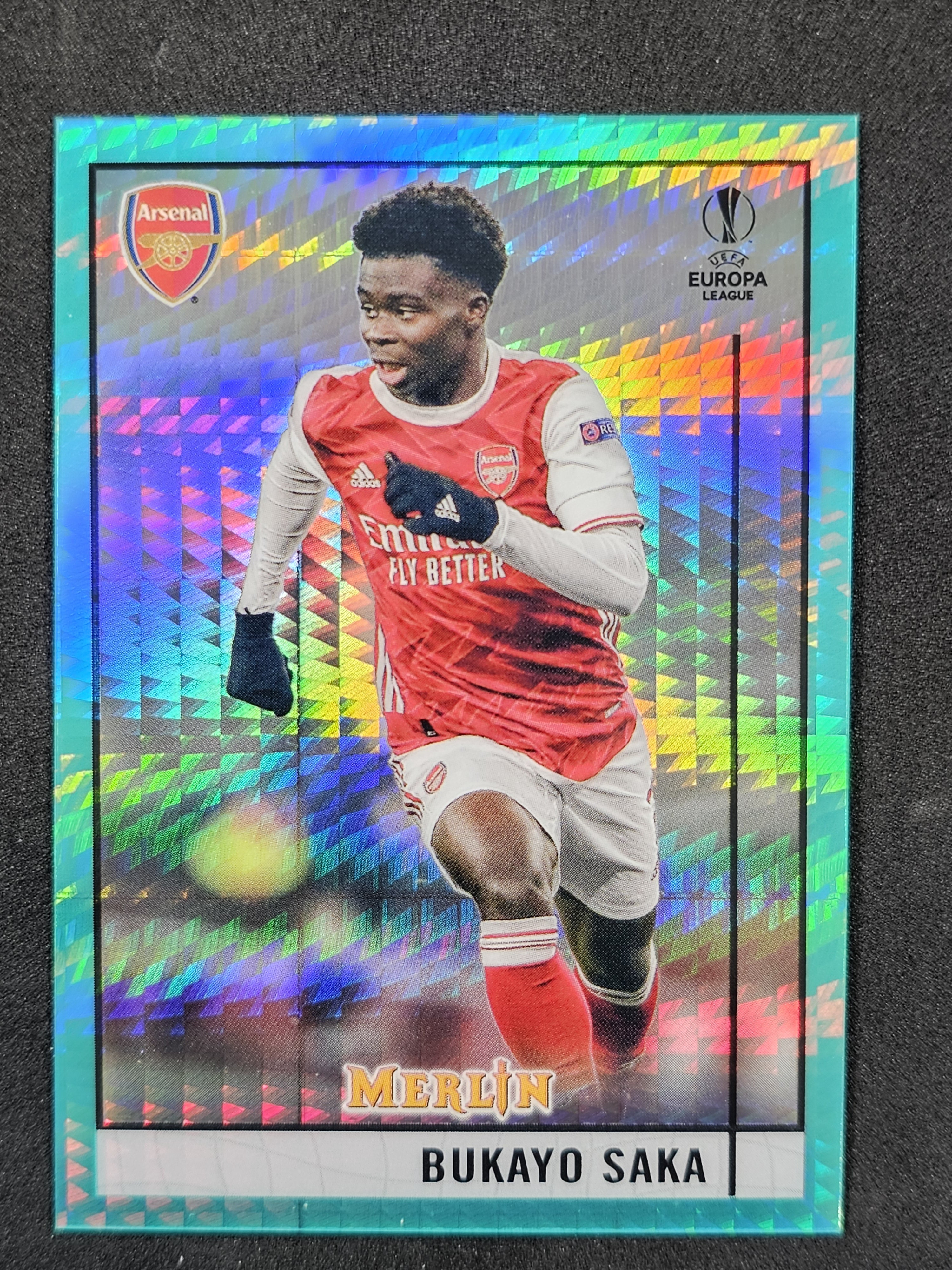 2020-21 Merlin UEFA Champions League #69 Bukayo Saka Aqua Prism